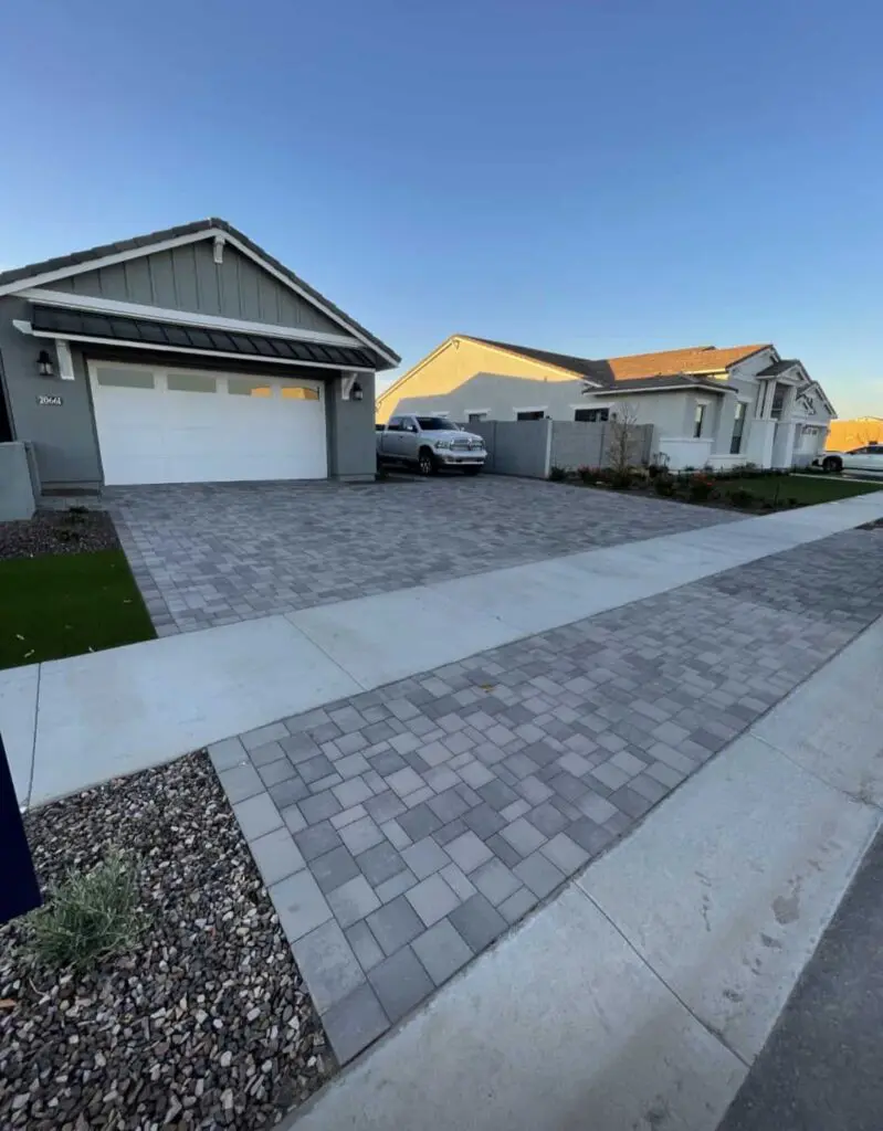 Driveway paved with a flat top paver in grey. At a home in Phoenix AZ