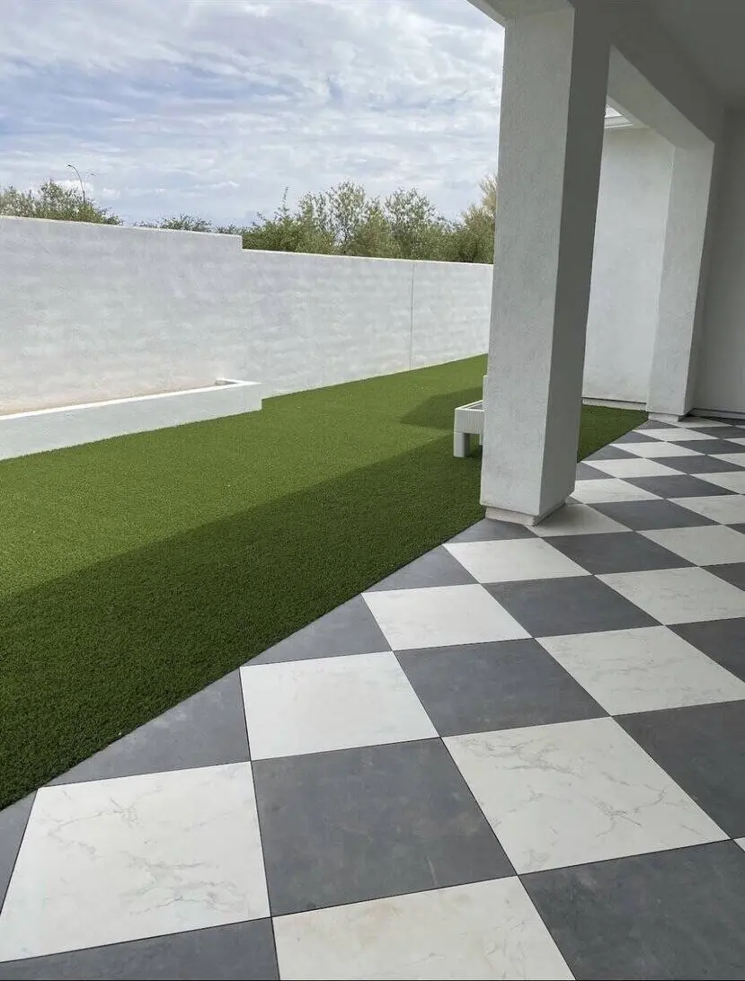 marble pavers in a checkerboard pattern installed at a Phoenix home by Apex Turf