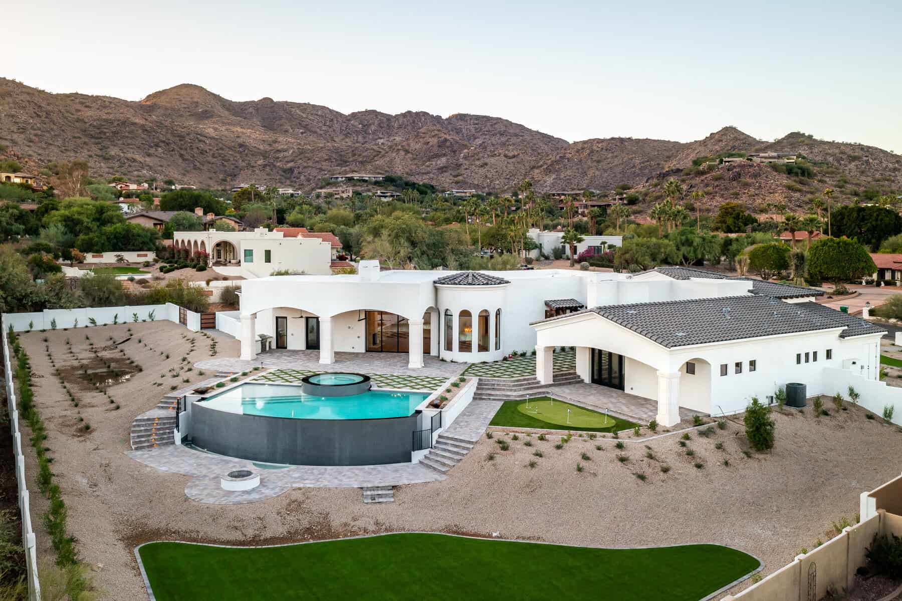 Drone image of a large home in Paradise Valley Arizona. Yard landscaped by Apex Turf