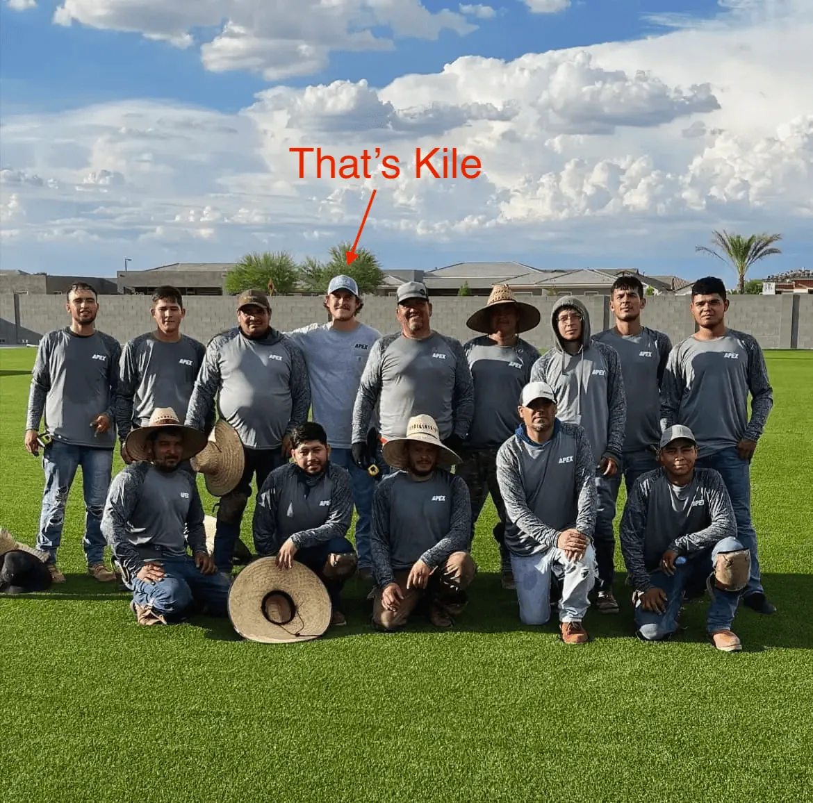 artificial turf installation company near you, Apex Turf. The crew stands and poses for this photo with Kile Dobberstein, the owner
